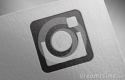 Instagram-glyph_1 on paper texture Editorial Stock Photo